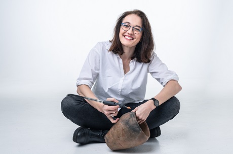 Veronika Brychová, with an ancient ceramic vessel