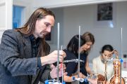Sean Coughlin vystudoval starověkou filozofii na MacGillově univerzitě v Montrealu a Západní univerzitě v Ontariu.  ezi studii se rok živil jako kuchař, aby lépe pochopil kulinářské metafory v aristotelovských biologických spisech.  Absolvoval vědecké stáže na Hebrejské univerzitě v Jeruzalémě a Humboldtově univerzitě v Berlíně. Podílel se na rekonstrukci parfému královny Kleopatry, který byl představen na výstavě Královny Egypta v Národním geografickém muzeu ve Washingtonu. Od roku 2021 je hlavním řešitelem projektu Alchymie vůní financovaného Grantovou agenturou ČR v programu JUNIOR STAR. Spolupracuje na něm se skupinou Chemie přírodních látek v Ústavu organické chemie a biochemie AV ČR.